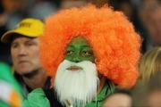 17 September 2011; A supporter in Irish colours watches the game. 2011 Rugby World Cup, Pool C, Australia v Ireland, Eden Park, Auckland, New Zealand. Picture credit: Brendan Moran / SPORTSFILE