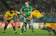 17 September 2011; Keith Earls, Ireland, in action against Tatafu Polota-Nau, left, and Rocky Elsom, Australia. 2011 Rugby World Cup, Pool C, Australia v Ireland, Eden Park, Auckland, New Zealand. Picture credit: Brendan Moran / SPORTSFILE