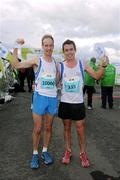 17 September 2011; Mark Hoey, Star of the Sea A.C., Co. Meath, right, with David John Carrie after winning the National Lottery Half Marathon. Phoenix Park, Dublin. Picture credit: Stephen McCarthy / SPORTSFILE