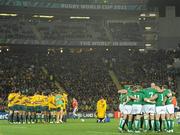 17 September 2011; Both teams gather together in huddles before the game. 2011 Rugby World Cup, Pool C, Australia v Ireland, Eden Park, Auckland, New Zealand. Picture credit: Brendan Moran / SPORTSFILE