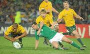 17 September 2011; Rob Kearney, Ireland, competes for a loose ball with James O'Connor and Will Genia, Australia. 2011 Rugby World Cup, Pool C, Australia v Ireland, Eden Park, Auckland, New Zealand. Picture credit: Brendan Moran / SPORTSFILE