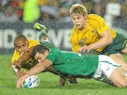 17 September 2011; Rob Kearney, Ireland, competes for a loose ball with James O'Connor and Will Genia, Australia. 2011 Rugby World Cup, Pool C, Australia v Ireland, Eden Park, Auckland, New Zealand. Picture credit: Brendan Moran / SPORTSFILE