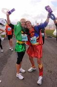 17 September 2011; Hannah Berkin and Suzie Favero, from London, England, following the National Lottery Half Marathon. Phoenix Park, Dublin. Picture credit: Stephen McCarthy / SPORTSFILE