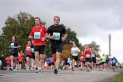17 September 2011; Conor McAuley, from Enfield, Co. Meath, left, and David Maloney, from Bray, Co. Wicklow, in action during the National Lottery Half Marathon. Phoenix Park, Dublin. Picture credit: Stephen McCarthy / SPORTSFILE