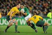 17 September 2011; Rob Kearney, Ireland, is tackled by Rocky Elsom, left, and Will Genia, Australia. 2011 Rugby World Cup, Pool C, Australia v Ireland, Eden Park, Auckland, New Zealand. Picture credit: Brendan Moran / SPORTSFILE