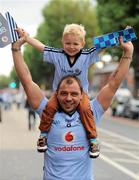 18 September 2011; Dublin supporters Adam Dalton, age 4, with his father Declan Dalton, from Crumlin, on their way to the match. Supporters at the GAA Football All-Ireland Championship Finals, Croke Park, Dublin. Picture credit: Brian Lawless / SPORTSFILE