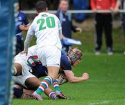 18 September 2011; James McConnon, Leinster, dives for the line to score his team's second try despite the tackles from Exiles players Richard Littlehohn and Jack Wheeler,20. Under 19 White Challenge, Leinster v Exiles, Donnybrook Stadium, Donnybrook, Dublin. Picture credit: Matt Browne / SPORTSFILE