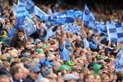 18 September 2011; Dublin supporters in the Cusack Stand celebrate a score. Supporters at the GAA Football All-Ireland Championship Finals, Croke Park, Dublin. Picture credit: Ray McManus / SPORTSFILE