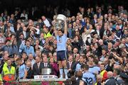 18 September 2011; Bernard Brogan, Dublin, stands holding the Sam Maguire Cup during the presentation at the end of the game. GAA Football All-Ireland Senior Championship Final, Kerry v Dublin, Croke Park, Dublin. Picture credit: David Maher / SPORTSFILE