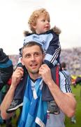 18 September 2011; Alan Brogan, Dublin, carries his son Jamie, aged 2, on his shoulders as he celebrates victory after the game. GAA Football All-Ireland Senior Championship Final, Kerry v Dublin, Croke Park, Dublin. Picture credit: Barry Cregg / SPORTSFILE