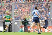 18 September 2011; Colm Cooper, Kerry, shoots past Dublin goalkeeper Stephen Cluxton to score his side's first goal. GAA Football All-Ireland Senior Championship Final, Kerry v Dublin, Croke Park, Dublin. Picture credit: Brian Lawless / SPORTSFILE