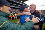 18 September 2011; Dublin manager Pat Gilroy, right, celebrates with Mickey Whelan, as Kerry manager Jack O'Connor steps in to congradulate them both at the end of the game. GAA Football All-Ireland Senior Championship Final, Kerry v Dublin, Croke Park, Dublin. Picture credit: David Maher / SPORTSFILE