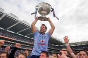 18 September 2011; Dublin captain Bryan Cullen lifts the Sam Maguire cup as he is raised shoulder high in front of Hill 16 as the Dublin team celebrate at the end of the game. GAA Football All-Ireland Senior Championship Final, Kerry v Dublin, Croke Park, Dublin. Picture credit: David Maher / SPORTSFILE