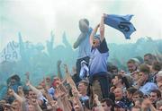 18 September 2011; A Dublin supporter celebrates after the final whistle. Supporters at the GAA Football All-Ireland Championship Finals, Croke Park, Dublin. Picture credit: Pat Murphy / SPORTSFILE