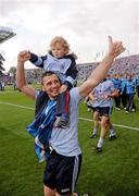 18 September 2011; Alan Brogan, Dublin, with his son Jamie, aged 2, celebrates victory after the game. GAA Football All-Ireland Senior Championship Final, Kerry v Dublin, Croke Park, Dublin. Picture credit: Stephen McCarthy / SPORTSFILE