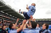 18 September 2011; Eoghan O'Gara, Dublin, is lifted shoulder high by his team-mate's the end of the game. GAA Football All-Ireland Senior Championship Final, Kerry v Dublin, Croke Park, Dublin. Picture credit: David Maher / SPORTSFILE
