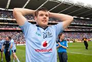 18 September 2011; Kevin McManamon, Dublin, takes it all in as his team-mates celebrate victory after the game. GAA Football All-Ireland Senior Championship Final, Kerry v Dublin, Croke Park, Dublin. Picture credit: Barry Cregg / SPORTSFILE