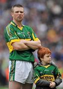 18 September 2011; A dejected Tomás Ó Sé, Kerry, with his son Michael, aged 5, after the game. GAA Football All-Ireland Senior Championship Final, Kerry v Dublin, Croke Park, Dublin. Picture credit: Barry Cregg / SPORTSFILE