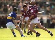 14 April 2002; Richie Murray of Galway in action against Eoin Kelly of Tipperary during the Allianz National Hurling League Quarter-Final match between Galway and Tipperary at Semple Stadium in Thurles, Tipperary. Photo by Brendan Moran/Sportsfile