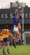14 April 2002; Cathal Collins of Cavan in action against Don Connellan of Roscommon during the Allianz National Football League Semi-Final match between Cavan and Roscommon at Cusack Park in Mullingar, Westmeath. Photo by Aoife Rice/Sportsfile