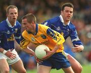 14 April 2002; Jonathan Dunning of Roscommon in action against Peter Reilly of Cavan during the Allianz National Football League Semi-Final match between Cavan and Roscommon at Cusack Park in Mullingar, Westmeath. Photo by Aoife Rice/Sportsfile