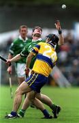 14 April 2002; Stephen Lucey of Limerick in action against Gerry Quinn of Clare during the Allianz National Hurling League Quarter-Final match between Clare and Limerick at Semple Stadium in Thurles. Photo by Brendan Moran/Sportsfile