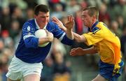 14 April 2002; James Doonan of Cavan in action against Jonathan Dunning of Roscommon during the Allianz National Football League Semi-Final match between Cavan and Roscommon at Cusack Park in Mullingar, Westmeath. Photo by Aoife Rice/Sportsfile