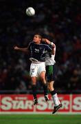 17 April 2002; Brian McBride of USA in action against Gary Breen of Republic of Ireland during the International Friendly match between Republic of Ireland and USA at Lansdowne Road in Dublin. Photo by Brendan Moran/Sportsfile