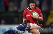 19 April 2002; David Wallace of Munster is tackled by John McWeeney of Leinster during the Interprovincial Championship match between Munster and Leinster at Musgrave Park in Cork. Photo by Damien Eagers/Sportsfile