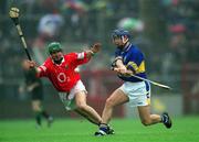 21 April 2002; Paul Kelly of Tipperary in action against Jerry O'Connor of Cork during the Allianz National Hurling League Semi-Final match between Cork and Tipperary at Páirc Uí Chaoimh in Cork. Photo by Ray McManus/Sportsfile