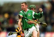 21 April 2002; Ciarán Carey of Limerick in action against Richard Mullally of Kilkenny during the Allianz National Hurling League Semi-Final match between Kilkenny and Limerick at Gaelic Grounds in Limerick. Photo by Damien Eagers/Sportsfile