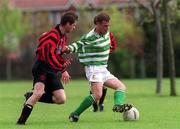 21 April 2002: Dean Walker of St Francis in action against Paul Follenous of Rush Athletic during the Leinster Senior League Vere Deane Cup Semi-Final match  between St Francis and Rush Athletic at Stanaway Park in Crumlin, Dublin. Photo by Ray Lohan/Sportsfile