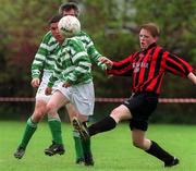 21 April 2002: Thomas Rooney of St Francis in action against Shane Hayden of Rush Athletic during the Leinster Senior League Vere Deane Cup Semi-Final match  between St Francis and Rush Athletic at Stanaway Park in Crumlin, Dublin. Photo by Ray Lohan/Sportsfile