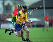 14 April 2002; John Mulvey of Rosommon in action against Des Murphy of Carlow during the Allianz National Hurling League Division 2 Relegation Play-Off match between Carlow and Roscommon at Cusack Park in Mullingar, Westmeath. Photo by Aoife Rice/Sportsfile