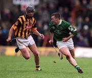 21 April 2002; Mark Foley of Limerick gets past John Hoyne of Kilkenny during the Allianz National Hurling League Semi-Final match between Kilkenny and Limerick at Gaelic Grounds in Limerick. Photo by Damien Eagers/Sportsfile