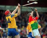 14 April 2002; Adrian Kelly of Roscommon in action against Liam Kenny of Carlow during the Allianz National Hurling League Division 2 Relegation Play-Off match between Carlow and Roscommon at Cusack Park in Mullingar, Westmeath. Photo by Aoife Rice/Sportsfile