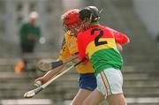 14 April 2002; Adrian Kelly of Carlow in action against Liam Kenny of Roscommon during the Allianz National Hurling League Division 2 Relegation Play-Off match between Carlow and Roscommon at Cusack Park in Mullingar, Westmeath. Photo by Aoife Rice/Sportsfile