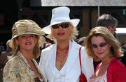 24 April 2002; Racegoers, from left, Eugina McEvoy, from Naas, Co. Kildare, left, Deirdre Langan, from Enfield, Co. Meath, centre and Ciara Lawlor from Castlknock enjoy the day out at Punchestown Racecourse in Naas, Kildare. Photo by Matt Browne/Sportsfile