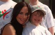 24 April 2002; Home from Home - at the launch of the 2003 Special Olympics World Games Families Programme, sponsored by Toyota are singer Andrea Corr and Special Olympian Joy Boland, 9 years from Glasnevin, Dublin. Photo by Ray McManus/Sportsfile