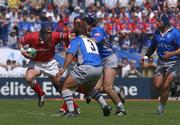 27 April 2002; Alan Quinlan of Munster goes past the tackle of Ignacio Fernandez Lobbe of Castres during the Heineken European Cup Semi-Final match between Castres and Munster at Stade de la Mediterranie in Beziers, France. Photo by Matt Browne/Sportsfile