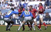 27 April 2002; Alan Quinlan of Munster supported by team-mate Jason Holland, in action against Isamelia Lassissi, left, and Norm Berryman of Castres during the Heineken European Cup Semi-Final match between Castres and Munster at Stade de la Mediterranie in Beziers, France. Photo by Brendan Moran/Sportsfile