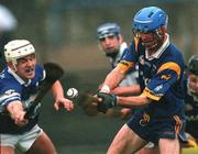 27 April 2002; Christy O'Toole of Wicklow in action against Darren Rooney of Laois during the Guinness Leinster Senior Hurling Championship First Round match between Wicklow and Laois at the County Grounds in Aughrim, Wicklow. Photo by Aoife Rice/Sportsfile