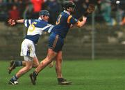 27 April 2002; Graham Keogh of Wicklow in action against Darren Joe Coogan of Laois during the Guinness Leinster Senior Hurling Championship First Round match between Wicklow and Laois at the County Grounds in Aughrim, Wicklow. Photo by Aoife Rice/Sportsfile