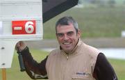 27 April 2002; Paul McGinley passes the scorekeepers board  as his walks off the 18th green showing his finishing score of 6 under and a course record of 65 during day three of the Smurfit Irish PGA Championship at Westport Golf Club in Westport, Mayo. Photo by David Maher/Sportsfile