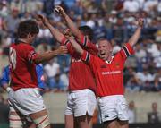 27 April 2002; Peter Stringer of Munster, celebrates with team-mates Donnacha O'Callaghan,19, and David Wallace after the Heineken European Cup Semi-Final match between Castres and Munster at Stade de la Mediterranie in Beziers, France. Photo by Matt Browne/Sportsfile