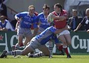 27 April 2002; John Kelly of Munster is tackled by Nicolas Spangherot of Castres during the Heineken European Cup Semi-Final match between Castres and Munster at Stade de la Mediterranie in Beziers, France. Photo by Brendan Moran/Sportsfile