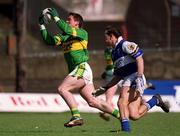 28 April 2002; Dara Ó Cinnéide of Kerry in action against Tom Kelly of Laois during the Allianz National Football League Division 2 Final match between Kerry and Laois at the Gaelic Grounds in Limerick. Photo by Brendan Moran/Sportsfile