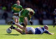 28 April 2002; Colm Cooper of Kerry in action against Pauraic Leonard of Laois during the Allianz National Football League Division 2 Final match between Kerry and Laois at the Gaelic Grounds in Limerick. Photo by Brendan Moran/Sportsfile