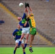 28 April 2002; Gary Sheehan of Kerry in action against Ronan Mac Niallais of Donegal during the All Ireland Intercounty Vocational Schools Football Final match between Donegal and Kerry at St Tiernach's Park in Clones, Monaghan. Photo by Pat Murphy/Sportsfile