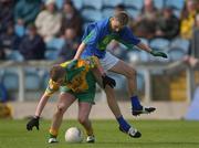 28 April 2002; Giles Grady of Kerry in action against Conal Molloy of Donegal during the All Ireland Intercounty Vocational Schools Football Final match between Donegal and Kerry at St Tiernach's Park in Clones, Monaghan. Photo by Damien Eagers/Sportsfile